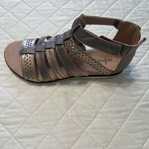 Clark’s Two-toned Metallic Gladiator sandals. New and never worn.